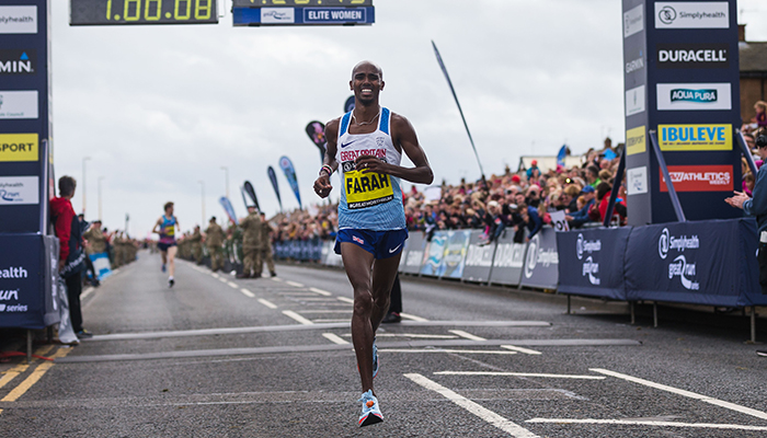 Sir Mo Farah crosses Great North Run finish line