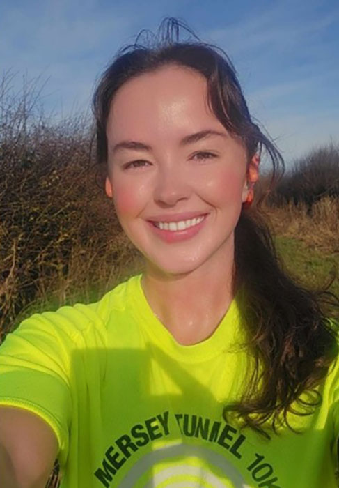 Image shows a smiling Mairead who is taking on  the Great Manchester Run.